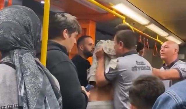 Metroda yaka paça kavga çıktı, güvenlik araya zor girdi
